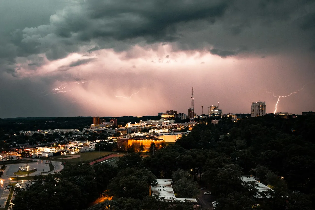 Roof Repair in Lawndale — lightning over a city at night